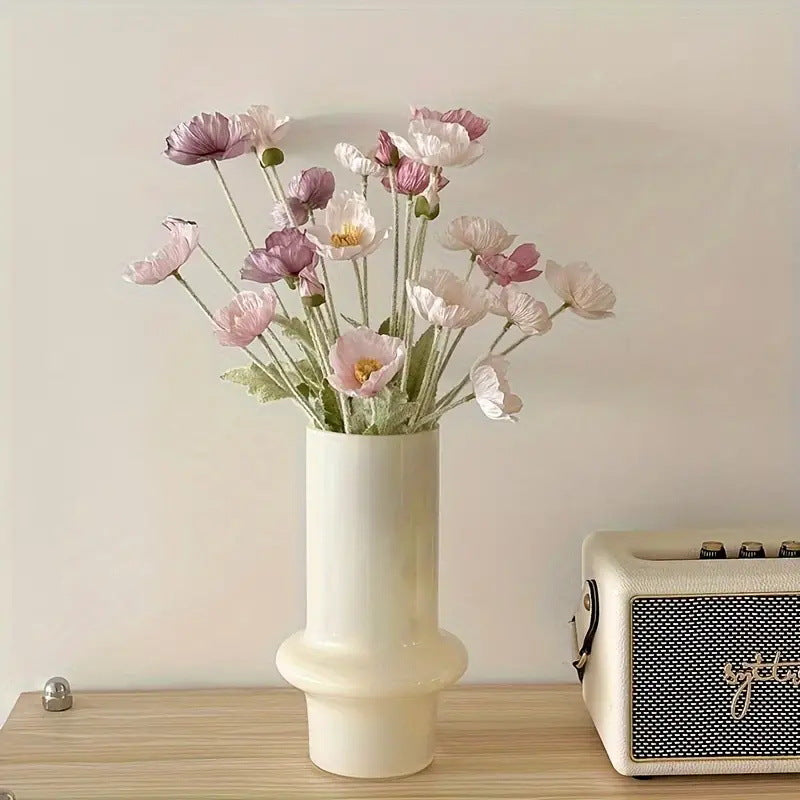 elegant artificial poppy floral arrangement in a vintage ceramic vase for aesthetic room decor