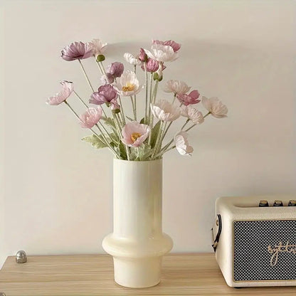 elegant artificial poppy floral arrangement in a vintage ceramic vase for aesthetic room decor