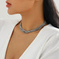 gorgeous model wearing the luxury bohemian multi row metallic chain choker necklace with beads