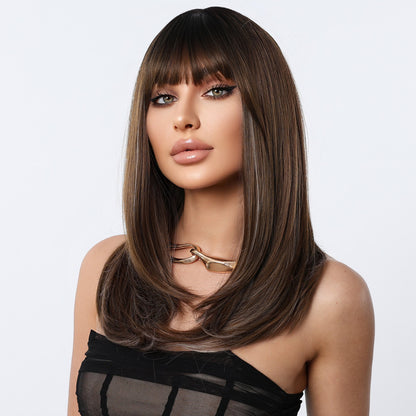 front view of the long straight dark brown synthetic wig with bangs worn by a model