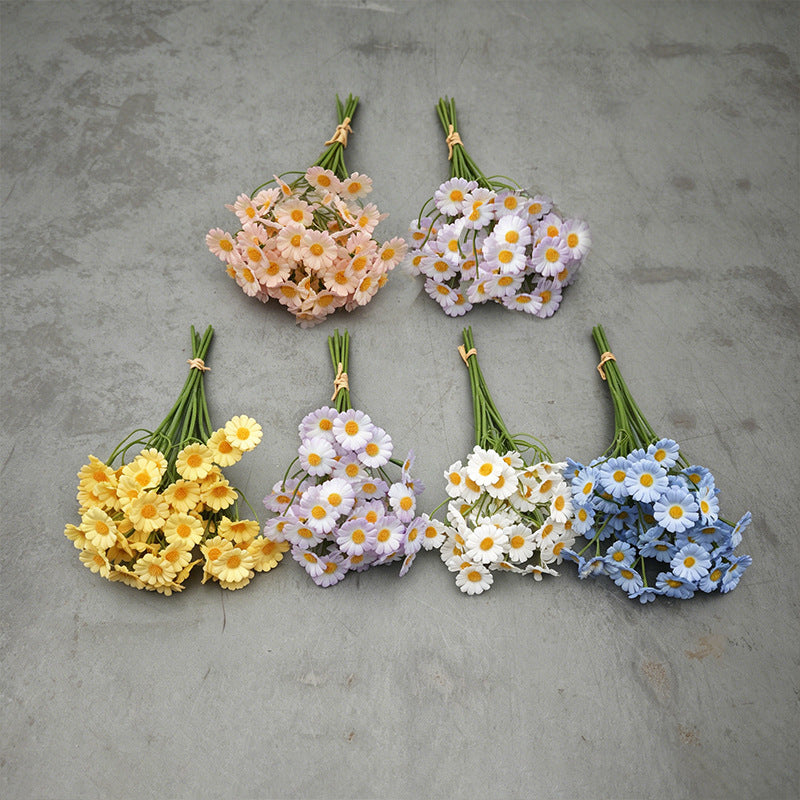 assorted color options for the realistic artificial daisy chamomile flower bouquets displayed on a grey background