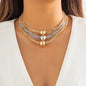 gorgeous model wearing the luxury bohemian multi row metallic chain choker necklace with beads