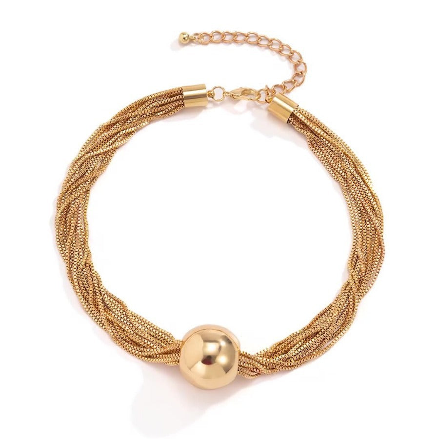 elegant minimalist multi strand layered chain necklace with metal beads on a clean background