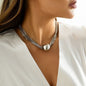 gorgeous model wearing the luxury bohemian multi row metallic chain choker necklace with beads