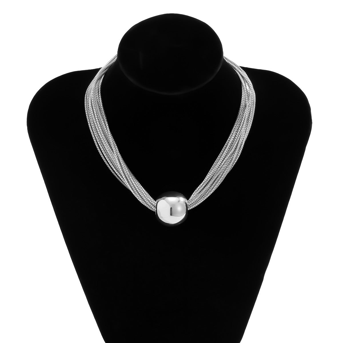 elegant minimalist multi strand layered chain necklace with metal beads on a clean background