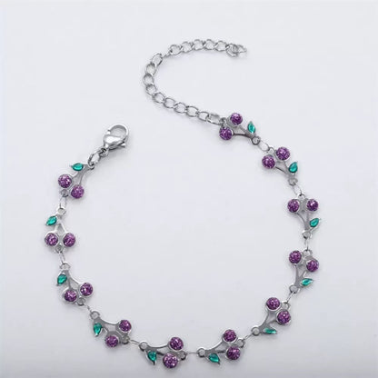 dainty sweet cherry charm link bracelet with playful shimmering summer wristwear design