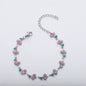 dainty sweet cherry charm link bracelet with playful shimmering summer wristwear design