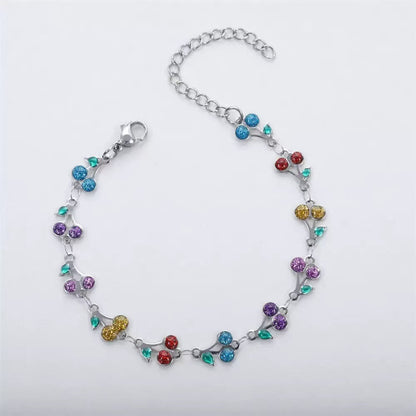 dainty sweet cherry charm link bracelet with playful shimmering summer wristwear design