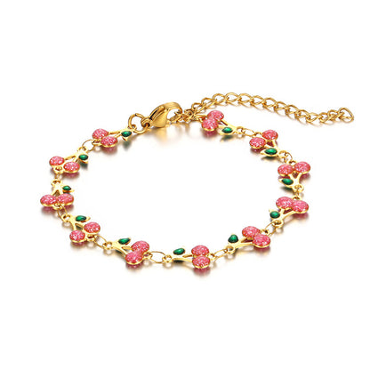 dainty sweet cherry charm link bracelet with playful shimmering summer wristwear design