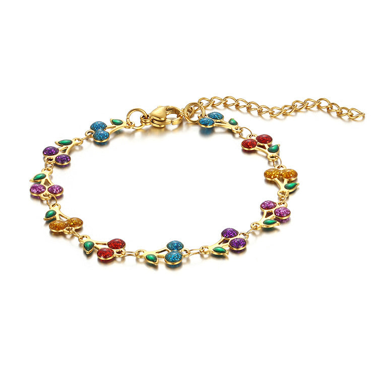 dainty sweet cherry charm link bracelet with playful shimmering summer wristwear design