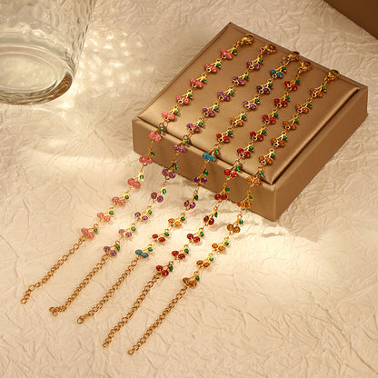 dainty sweet cherry charm link bracelet with playful shimmering summer wristwear design