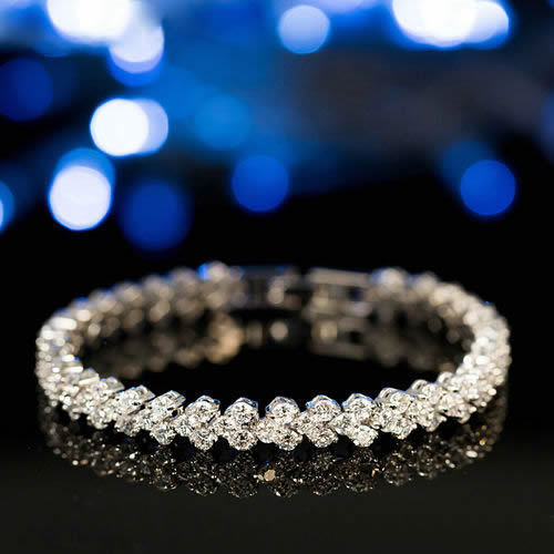 dazzling crystal wave tennis bracelet in silver with high grade cubic zirconia elements and model styling insert