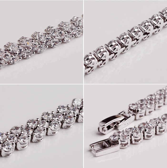 detailed close up of iced out sparkling crystal stones on the luxury wave tennis bracelet displaying micro pave craftsmanship