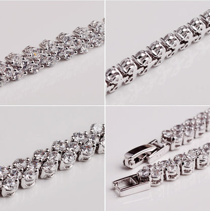 detailed close up of iced out sparkling crystal stones on the luxury wave tennis bracelet displaying micro pave craftsmanship