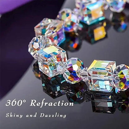 detailed close up of multi faceted aurora cube crystal beads displaying three hundred and sixty degree refraction