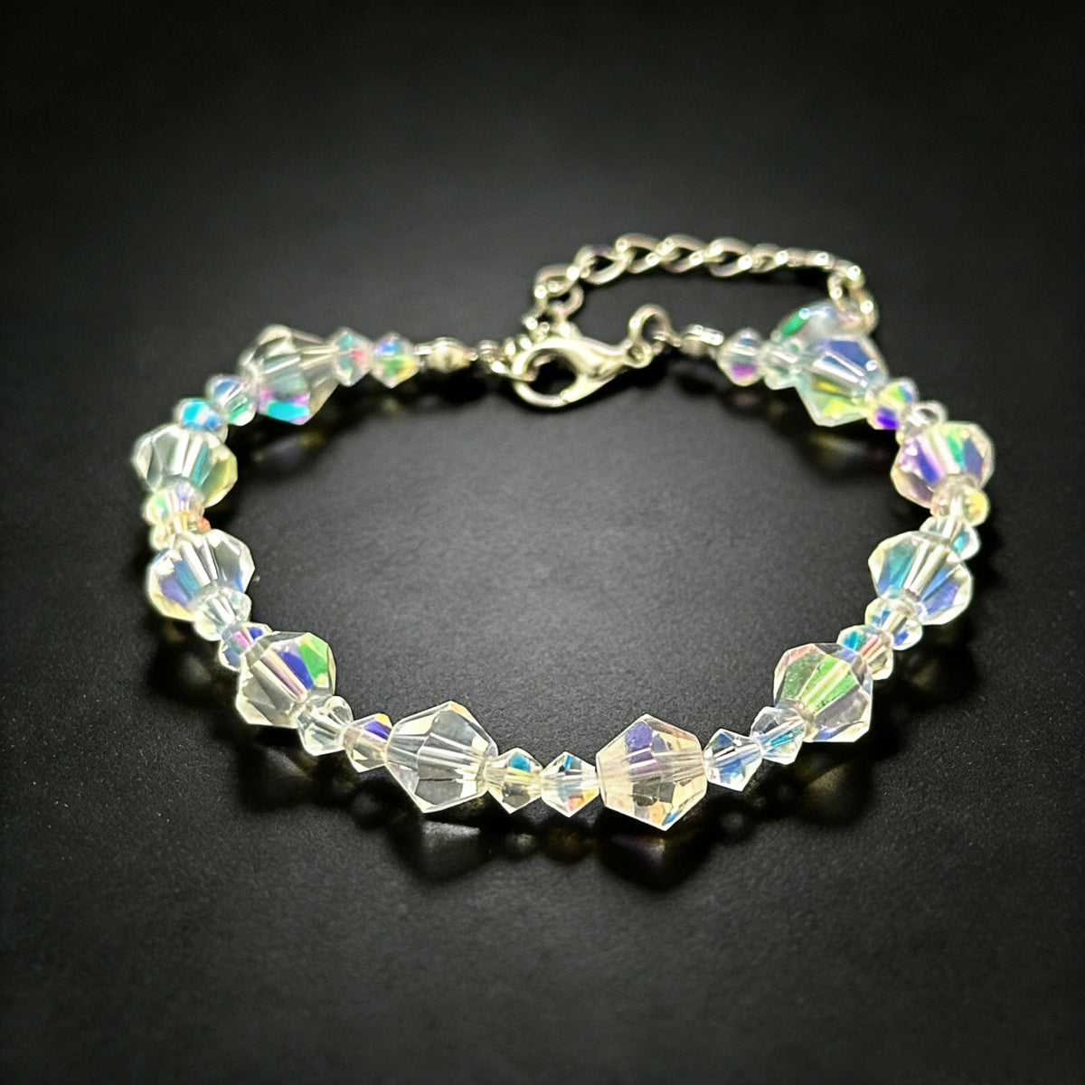 elegant sparkling bicone crystal beaded chain bracelet in size one variant on a clean dark background