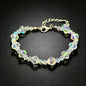 elegant sparkling bicone crystal beaded chain bracelet in size one variant on a clean dark background