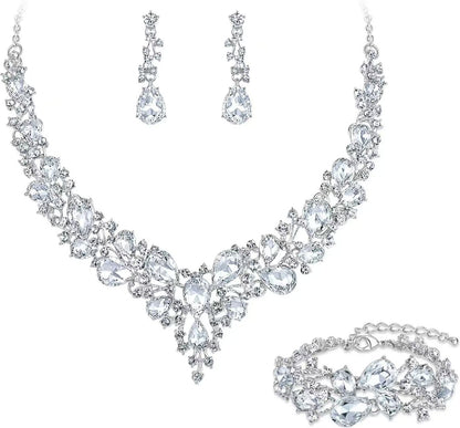 elegant waterdrop crystal bridal jewelry set in classic silver color featuring a rhinestone pendant necklace drop earrings and matching bracelet
