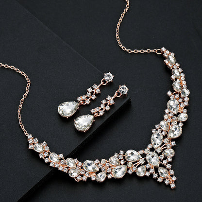 elegant waterdrop crystal bridal jewelry set in rose gold color featuring the full rhinestone necklace and fluid drop earrings