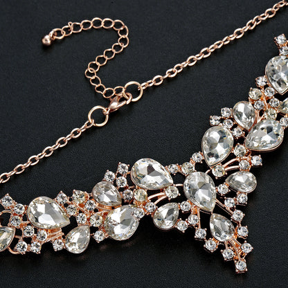 elegant waterdrop crystal bridal jewelry set in rose gold showing a detailed view of its adjustable extender chain and clasp
