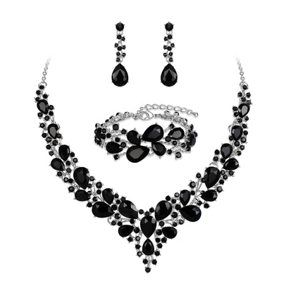 elegant waterdrop crystal bridal jewelry set in sleek black color featuring a rhinestone pendant necklace drop earrings and matching bracelet