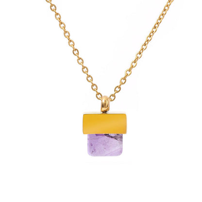 elegant gold chain necklace with a square purple natural stone geometric pendant on a clean background