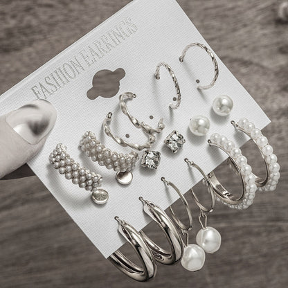 gold chunk hoop pearl earrings set variant arranged on a textured display card showcasing vintage golden elements