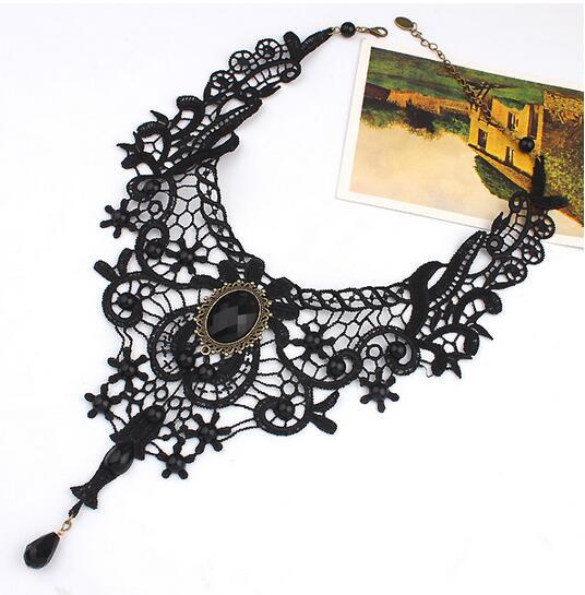 gothic black lace choker necklace with dark vintage elements and intricate mesh detail displayed on a white background