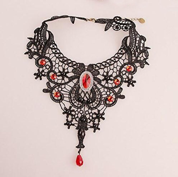 gothic black lace choker necklace with vintage red rhinestone accents and dramatic teardrop crystal pendant