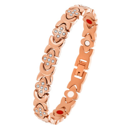 premium titanium steel magnetic therapy bracelet in elegant rose gold color displaying crystal paved elements and internal elements