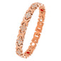 premium titanium steel magnetic therapy bracelet in elegant rose gold color displaying crystal paved elements and internal elements