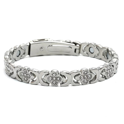 premium titanium steel magnetic therapy bracelet in classic silver color with internal magnetic elements and clover motif details