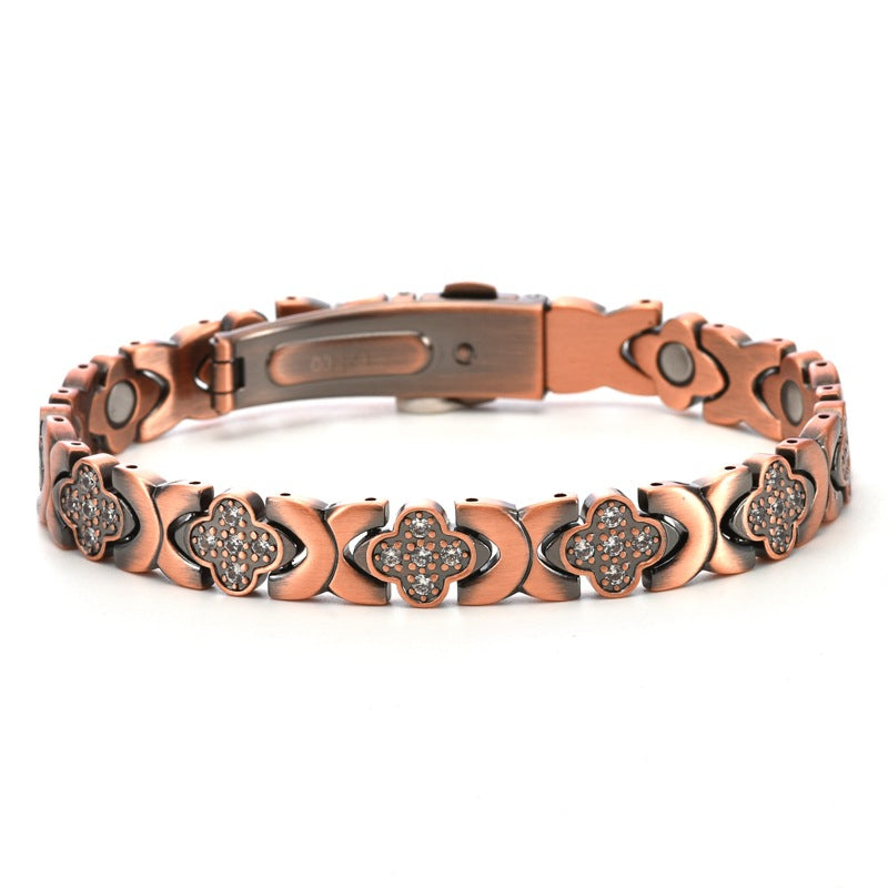 premium titanium steel magnetic therapy bracelet variant in vintage bronze displaying intricate clover patterns and polished craft
