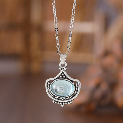 vintage palace style blue gemstone jewelry set with antique silver necklace and earrings
