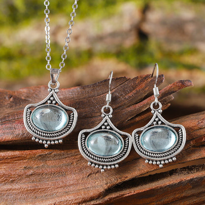 vintage palace style blue gemstone jewelry set with antique silver necklace and earrings